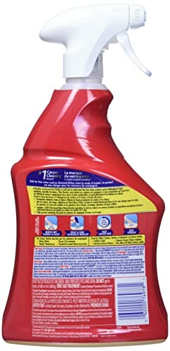 Back view of a red cleaning spray bottle with label