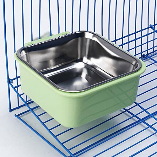 Green pet food bowl with stainless steel interior on a blue wire rack.