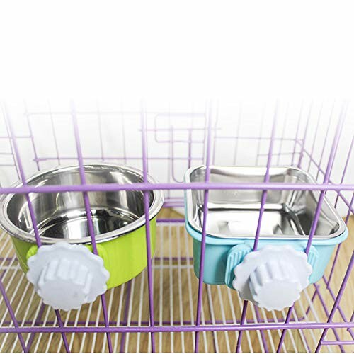 Pet cage with attached food and water bowls.